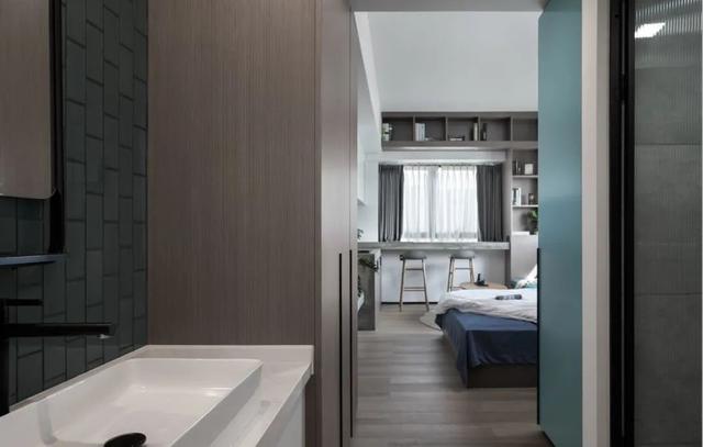 酒店公寓裝修效果圖(35㎡酒店式開(kāi)間單身公寓，半平米都沒(méi)浪費(fèi)，還裝得很有檔次)(圖2)